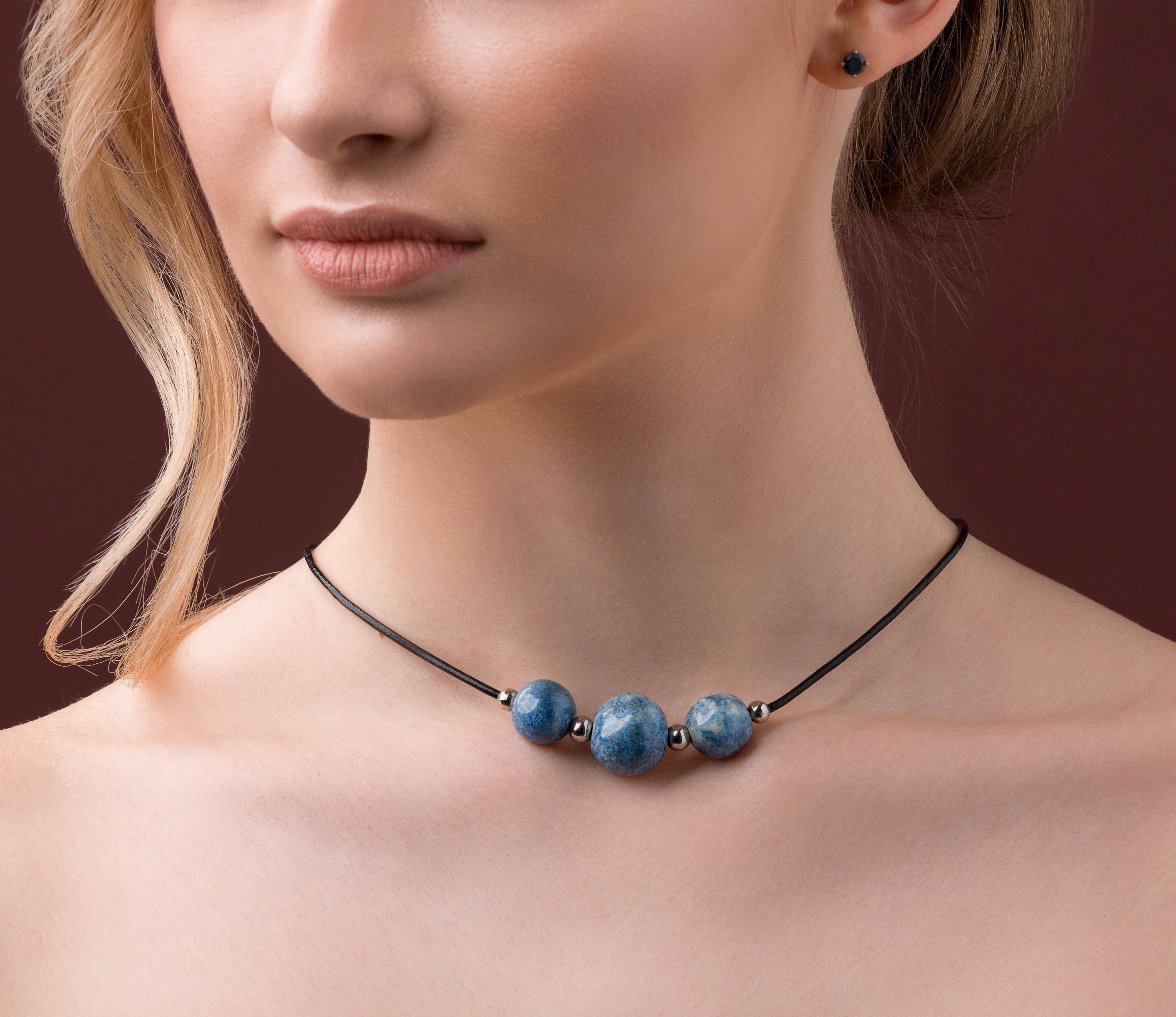 Leather necklace with blue ceramic beads